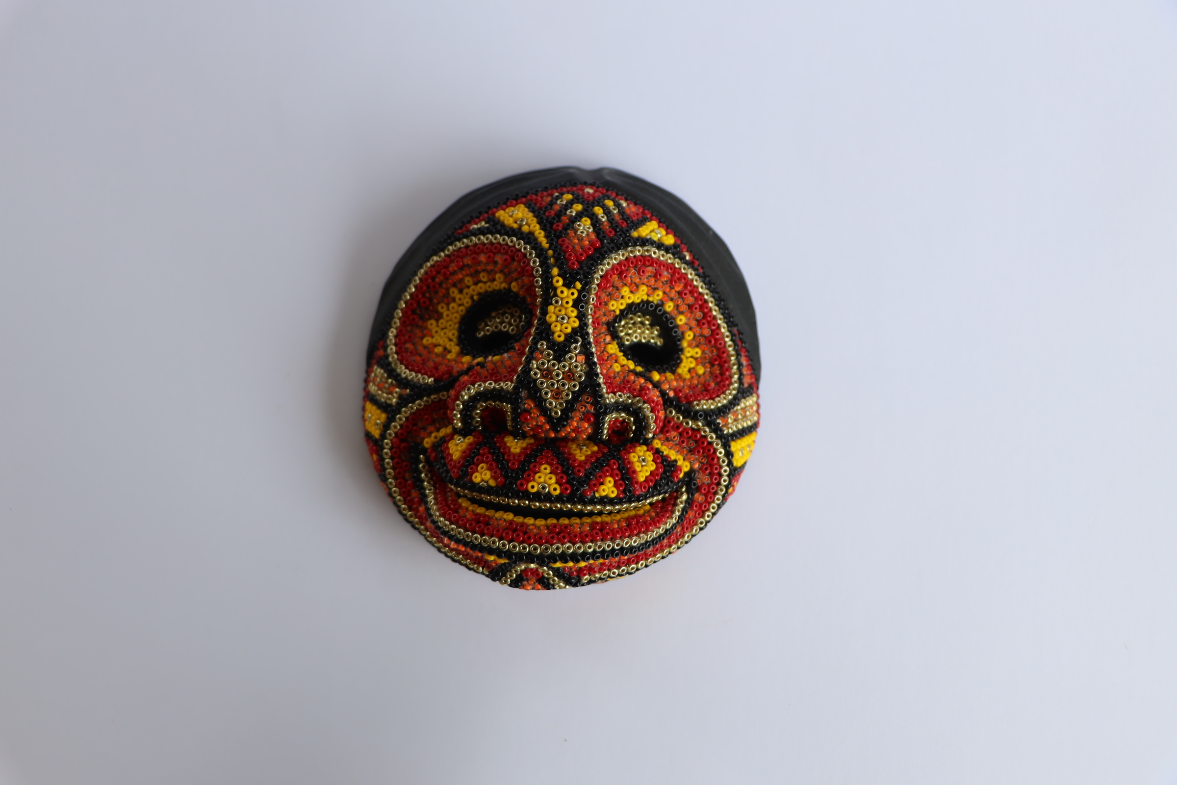 Máscara de Sabiduría "Tejido de Fuego"